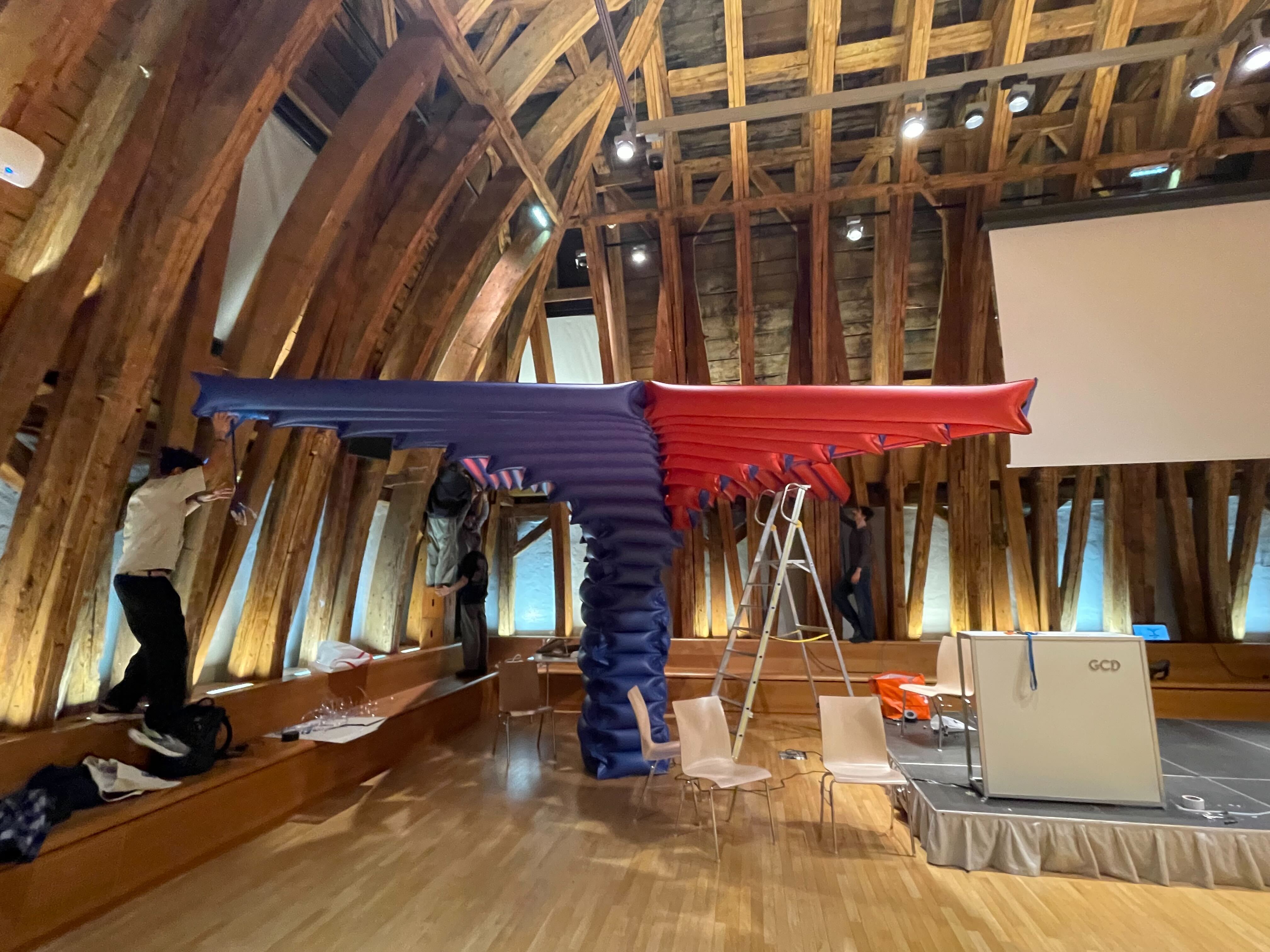 T-Umbrella 2.0: Fabrication-Driven Redesign of an Inflatable Curved-Folding Pavilion